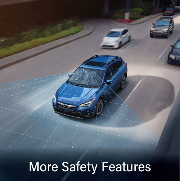 A Subaru Crosstrek in blue with the words “More Safety Features“. | Sommer's Subaru in Mequon WI
