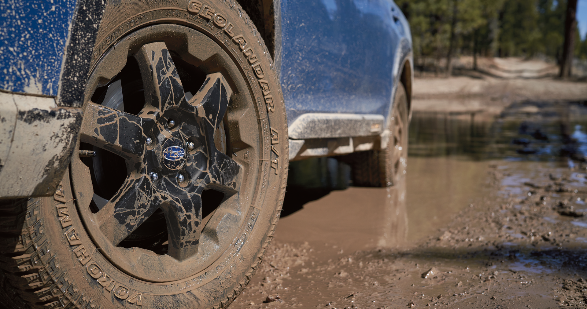 A close-up of the 17-inch off-road wheels and all-terrain Yokohama GEOLANDAR® tires on the 2023 Outback Wilderness. | Sommer's Subaru in Mequon WI
