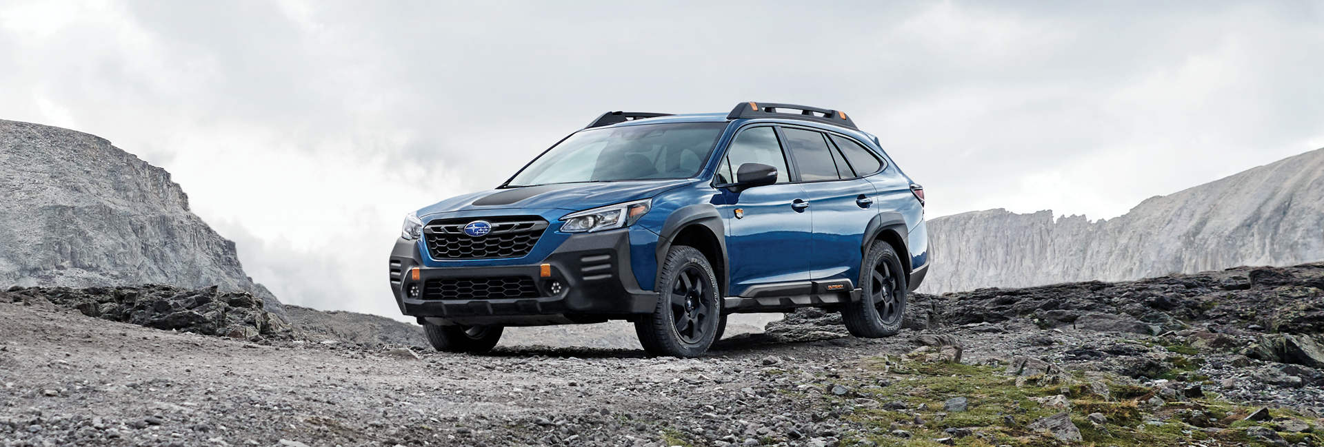 A 2023 Outback Wilderness parked in the mountains. | Sommer's Subaru in Mequon WI