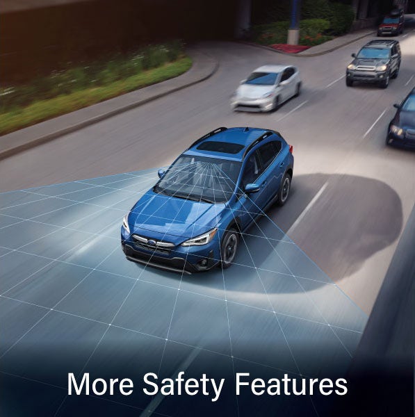A Subaru Crosstrek in blue with the words &ldquo;More Safety Features&ldquo;. | Sommer's Subaru in Mequon WI
