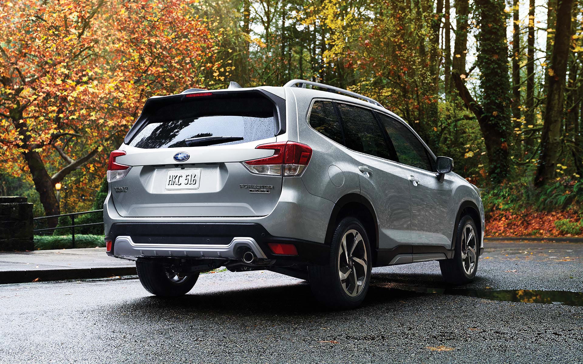 The rear of the 2022 Forester on a neighborhood street. | Sommer's Subaru in Mequon WI
