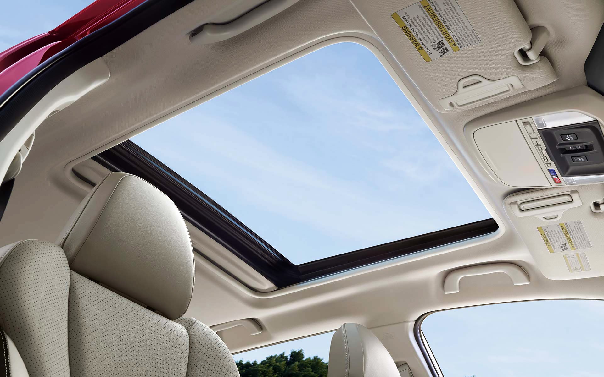 A view through the power sliding panoramic moonroof on the 2022 Forester Sport. | Sommer's Subaru in Mequon WI