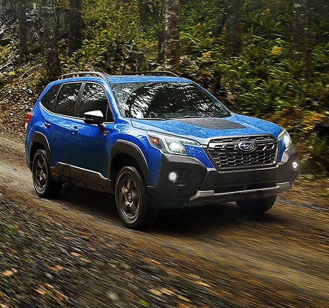 A 2022 Forester driving on a highway. | Sommer's Subaru in Mequon WI
