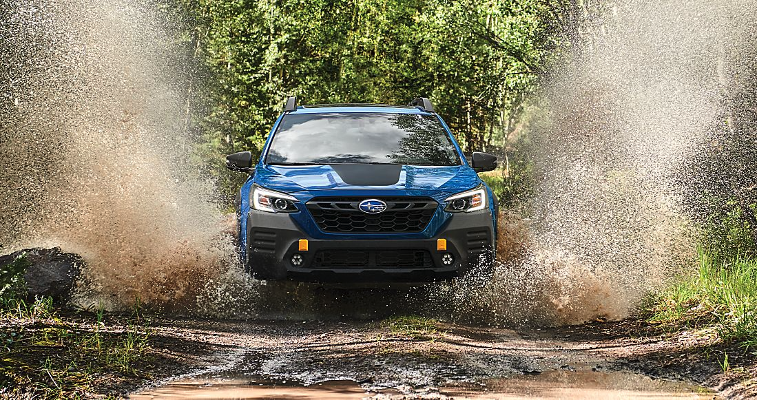 2023 Subaru Outback Wilderness driving through mud